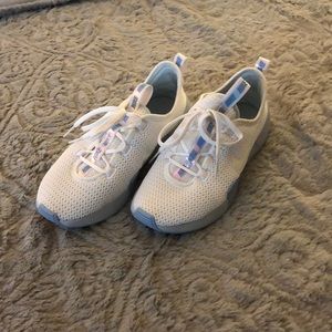 Nike white sneakers with iridescent logo